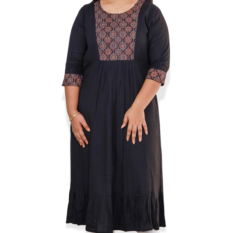 Anjali wringle reyon with ajrakh cotton black with small floral patch top Anjali wringle reyon with ajrakh cotton black with small floral patch top